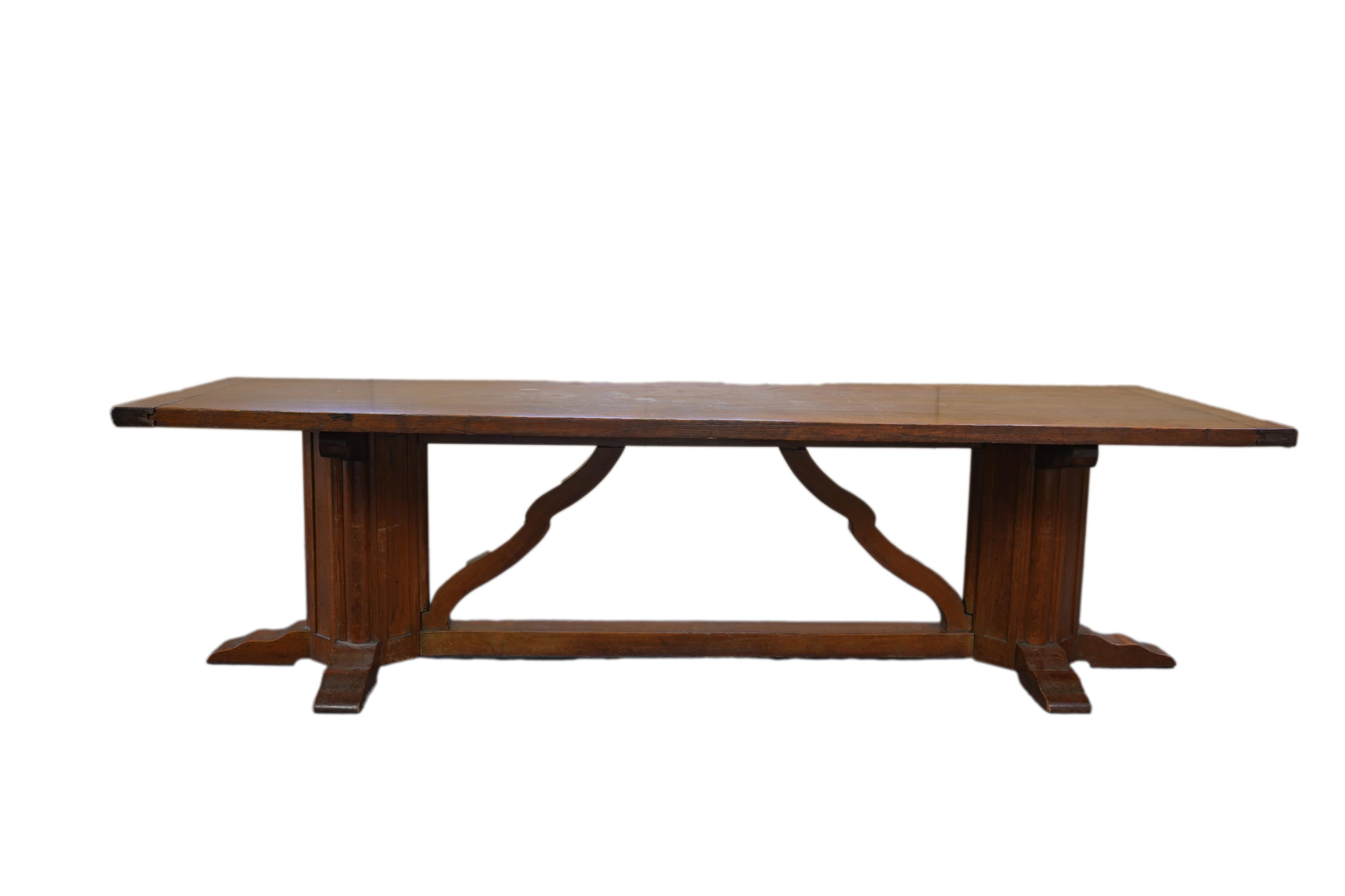 An Arts and Crafts oak refectory dining table